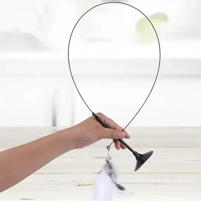 Interactive cat toy with steel wire, feathers, and bell