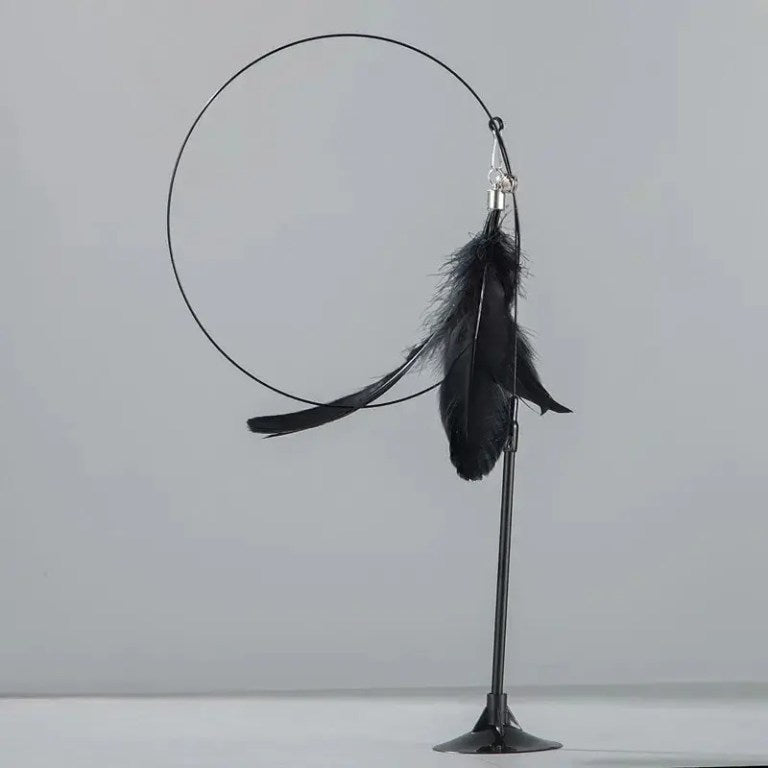 Interactive cat toy with steel wire, feathers, and bell
